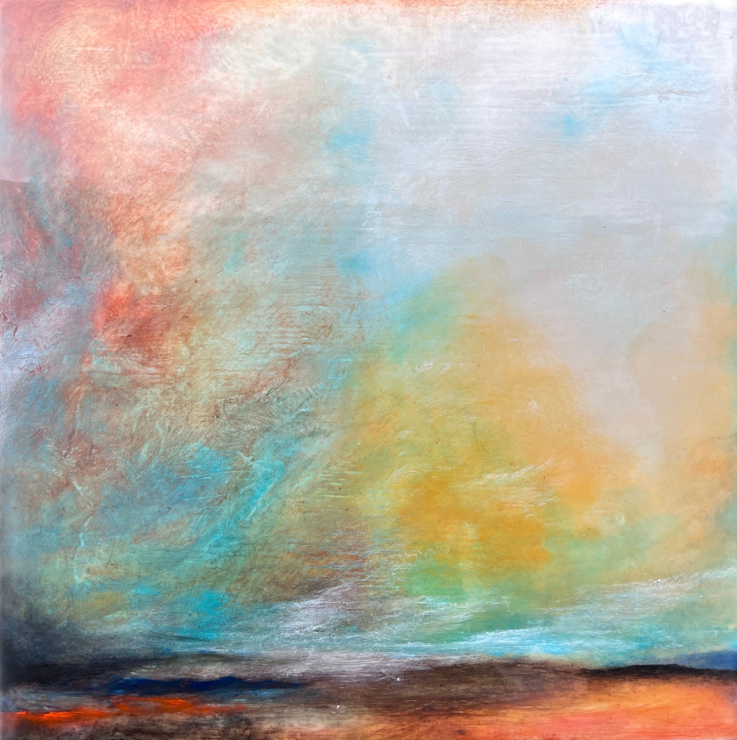 Abstract painting representing the sun rising over a landscape. The sky is nearly every color ranging from blue to pink. 12"x12" encaustic by Shannon Mello