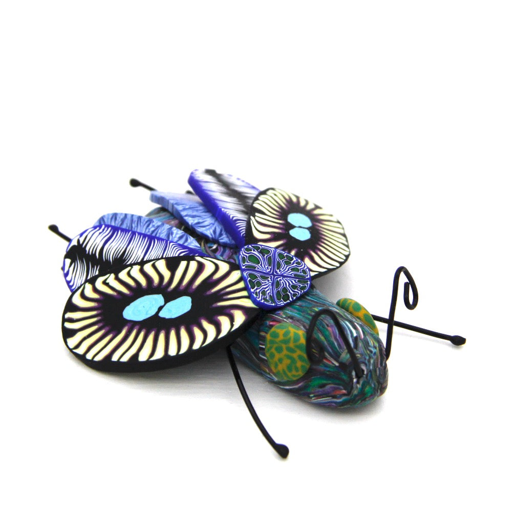 Handcrafted polymer creatures by Pat Ellis