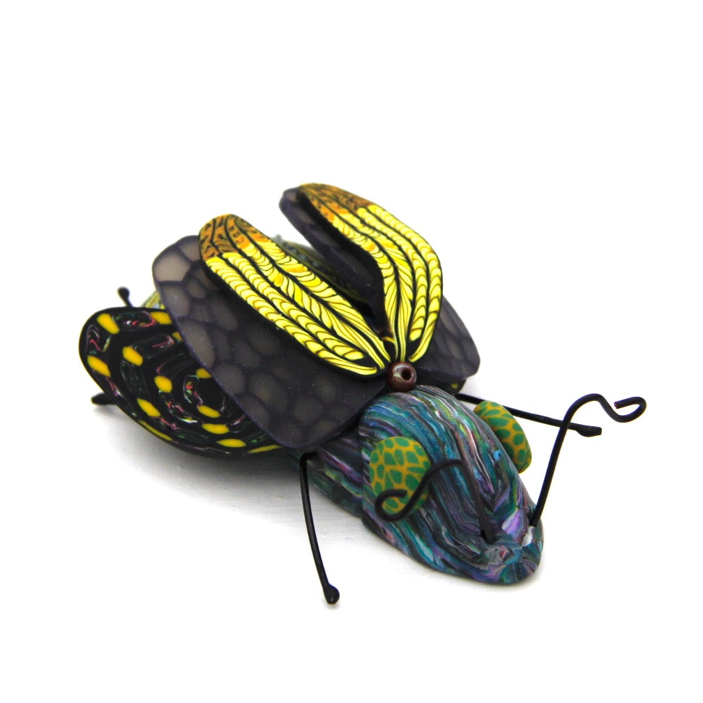 Handcrafted polymer creatures by Pat Ellis