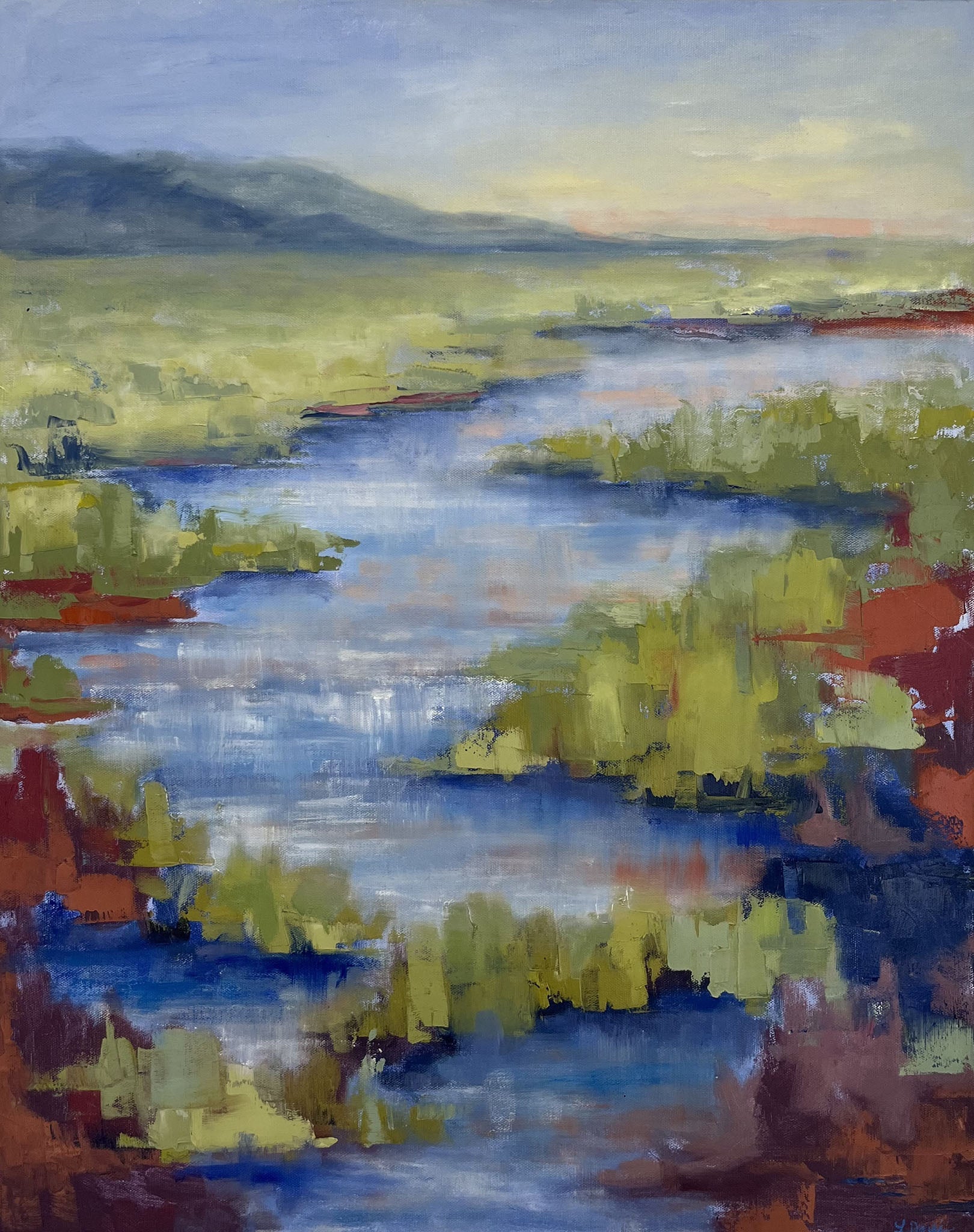 Painting depicting a river running through a field. The river is a bright blue while the grass surrounding the river is a light green. You can see the outline of a mountain range in the distance in the top left section of the painting. 30"x24"x1.5" oil by Lelia Davis