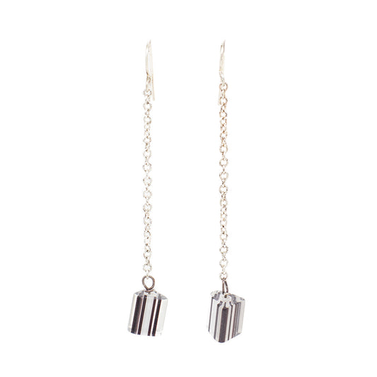 Silver dangle earrings with black and white epoxy accents by Morgan Pfaelzer Designs
